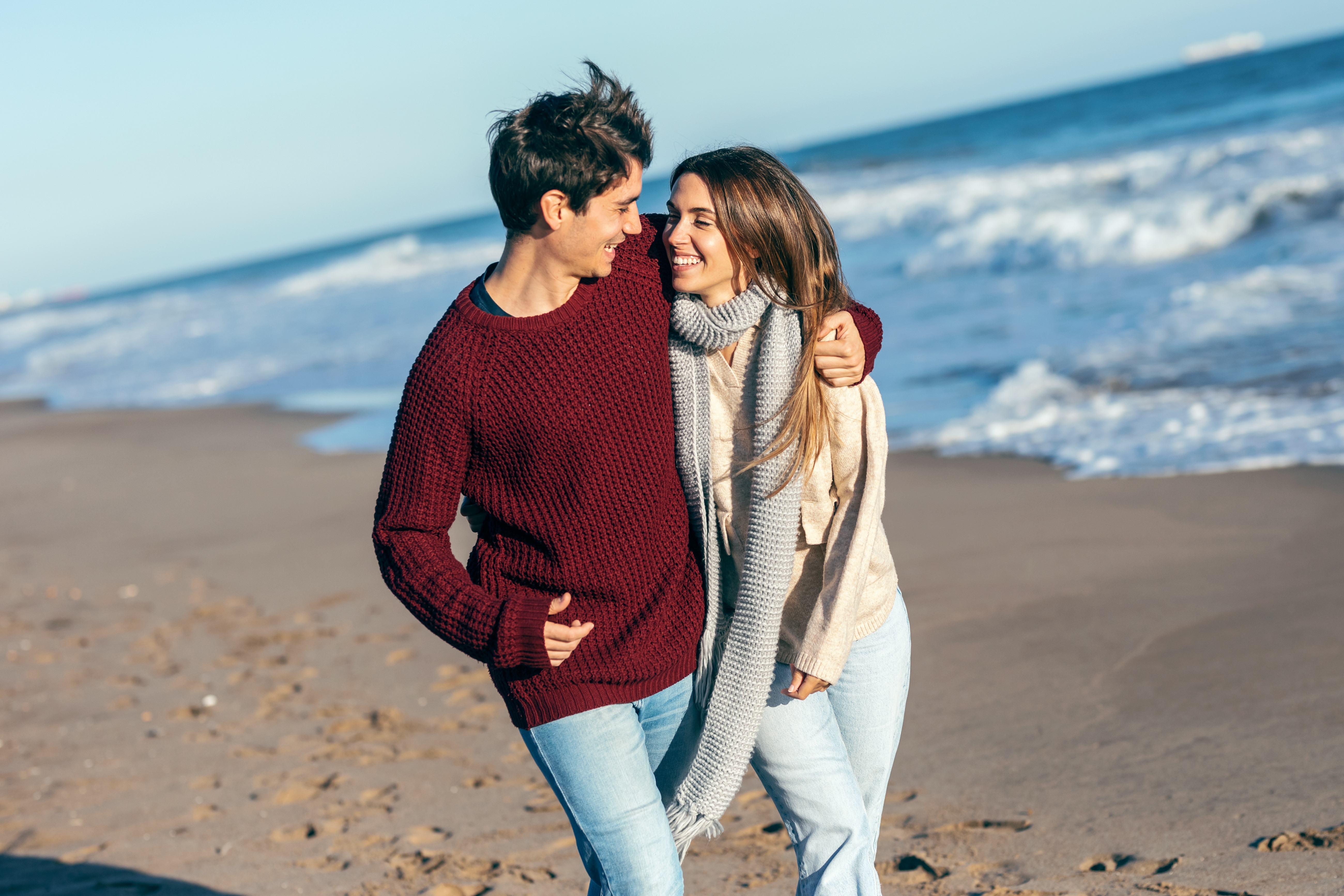 couple walking along the beach