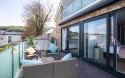 the balcony with hot tub at the Sandymere apartment westward Ho!