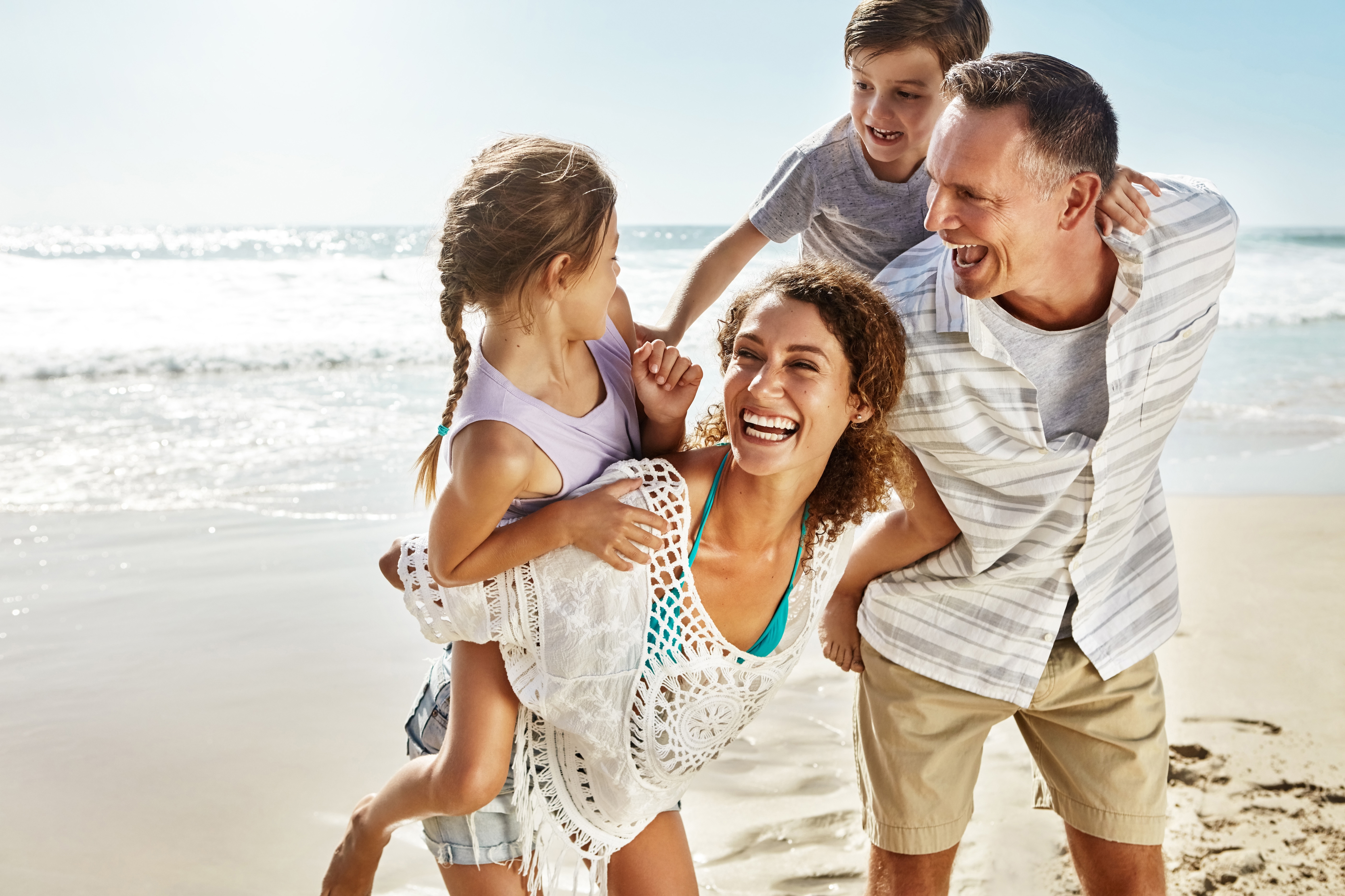 family on the beach having fun
