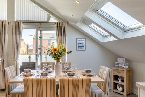 the open plan living space in the Beachcomber apartment 