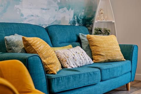 Comfy sofas in the lounge at Pebble Ridge