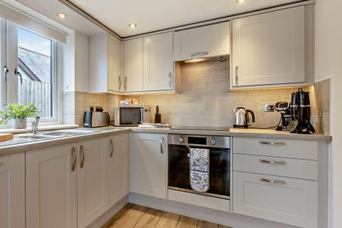 the modern kitchen in the Sandymere apartment