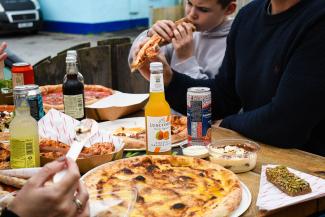 Family eating pizza