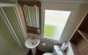 family bahtroom in the 2016 Swift Loire 28x12