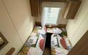 twin bedroom in the 2016 Swift Loire 28x12